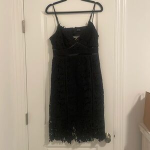 Beautiful black cocktail dress with lace overlay size: L/10